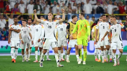 2. Germany (=): 'Die Mannschaft' remains undefeated in the tournament after beating Denmark.  The hosts have improved throughout the competition, but there is no doubt that fortune has played in their favor. 