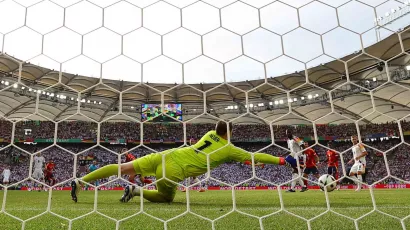 The German goalkeeper stretched as much as he could.