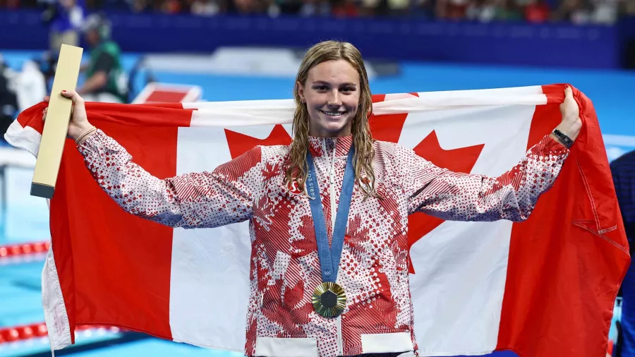 Con un tiempo de 2:03.03 minutos, la canadiense superó la marca de la china Zhang Yufei.